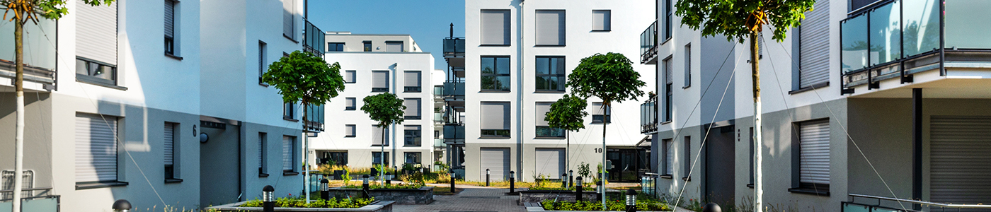 KI Bild einer modernen Mehrfamilienhaus Wohnsiedlung